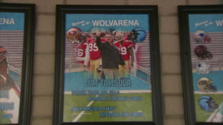 A picture of Jim Tomsula hangs on the Wall of Honor at Woodland Hills High School.