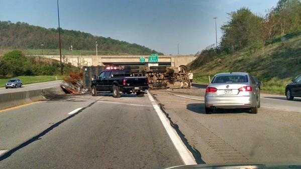 Photos: Overturned tractor trailer forces closures on Interstate 70