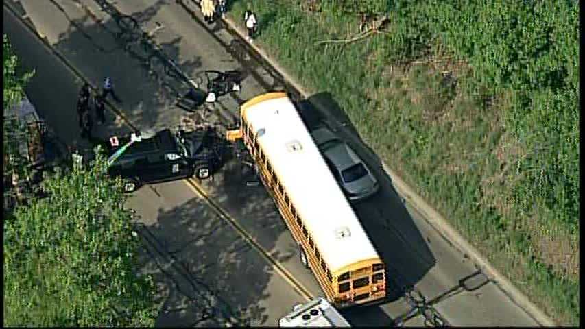 Photos: School bus and 2 cars collide on Washington Boulevard