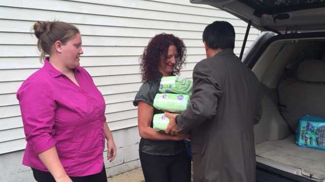 A donation of diapers is made to the Center for Victims.