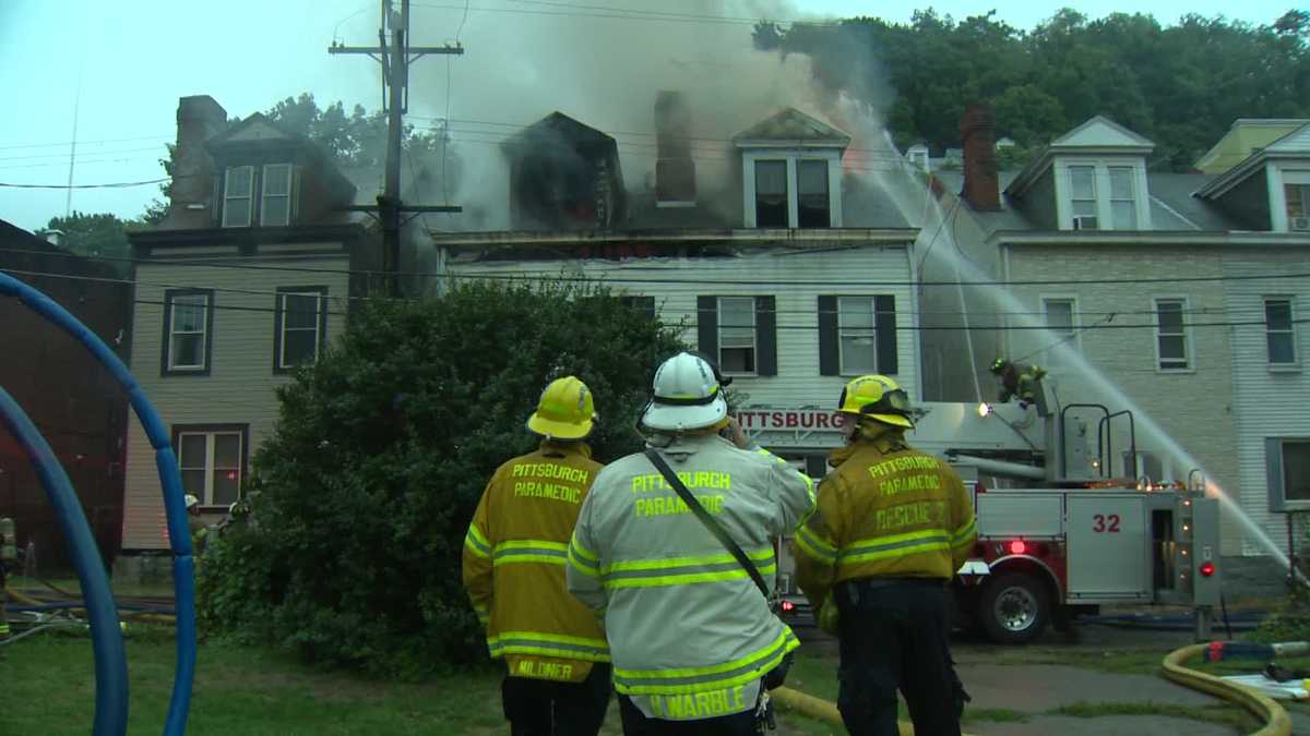 Photos: Fire burns through vacant North Side house