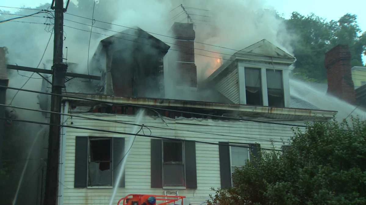 Photos: Fire burns through vacant North Side house