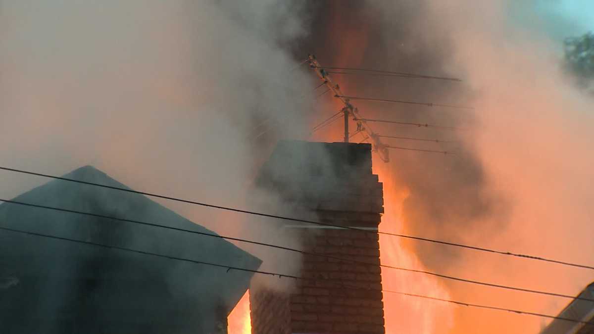 Photos: Fire burns through vacant North Side house