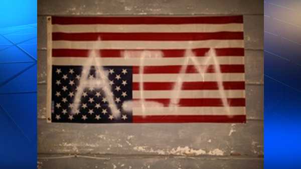 Free speech? Police sued over seizure of man's upside-down protest flag