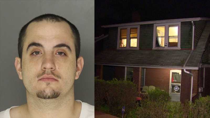 Police say Robert Hunter (pictured) is charged with killing Mark Lopata at this house on Harker Street in Elliott.