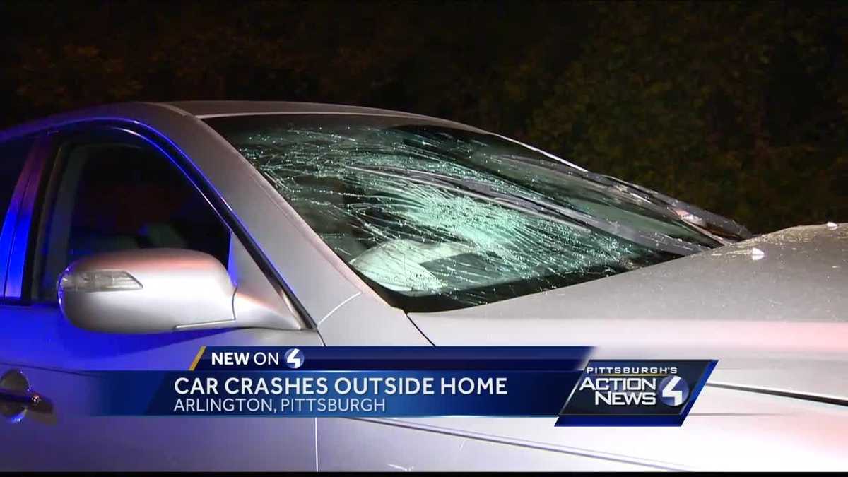 Car crashes outside home in Arlington