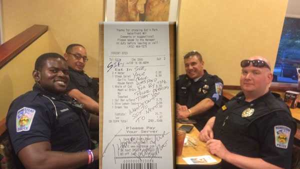 The four Homestead police officers who were at the Homestead Eat N' Park and the bill they paid for a couple who didn't want to be seated near them.