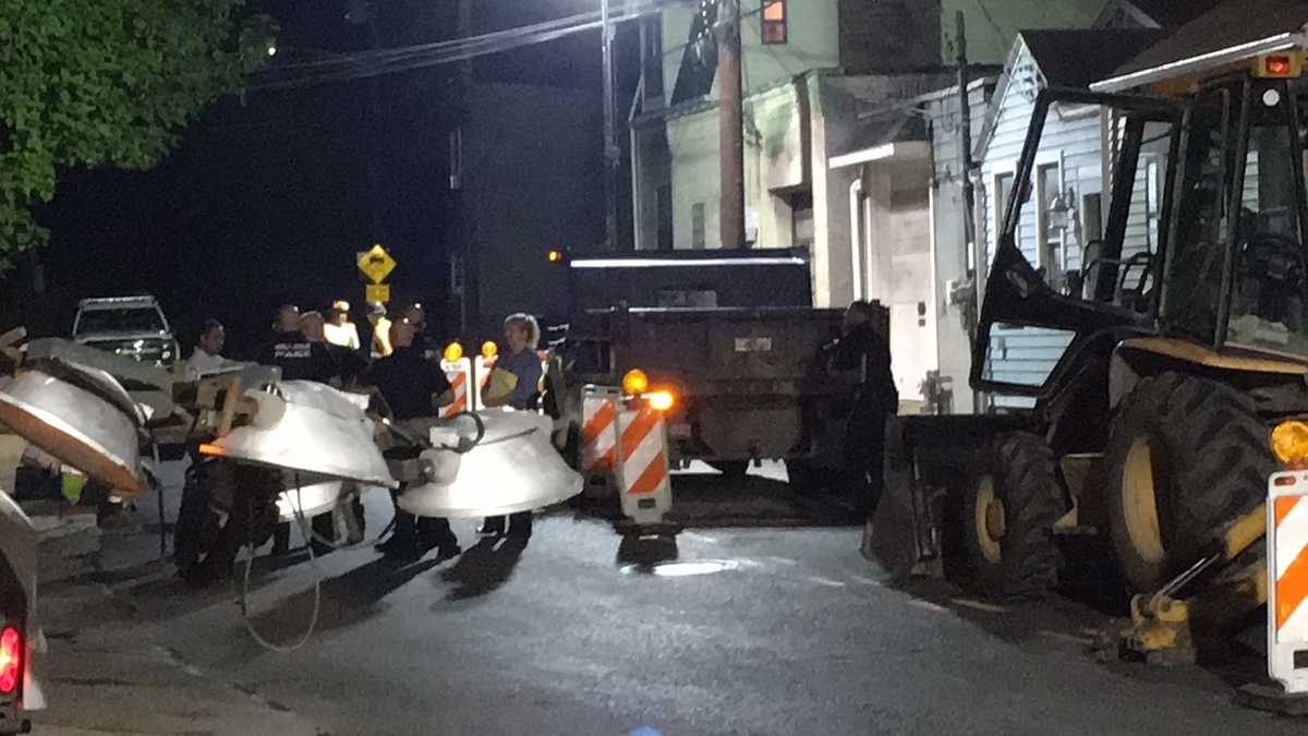 Man working in manhole run over by dump truck