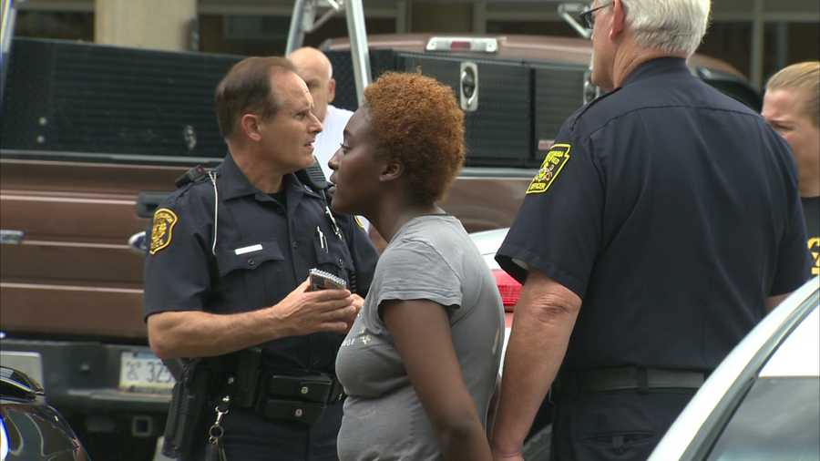A woman is facing charges after her baby was injured Sunday in the parking lot of a grocery store on Centre Avenue.