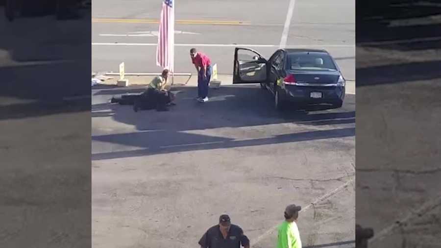 Out-of-control car hits cop, who opens fire outside store