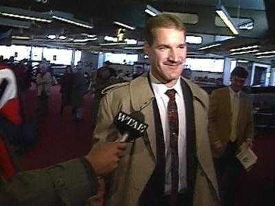Here's another "flashback" shot of Cowher at the old Greater Pittsburgh International Airport. (Check out the old school WTAE microphone flag.)