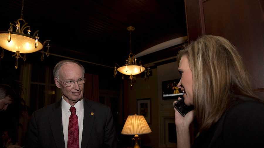 Republican Gov. Robert Bentley takes the phone call from Rebekah Mason announcing his win for Alabama governor, Tuesday, Nov. 4, 2014, in Montgomery, Ala. Bentley defeated his opponent Democrat Parker Griffith.