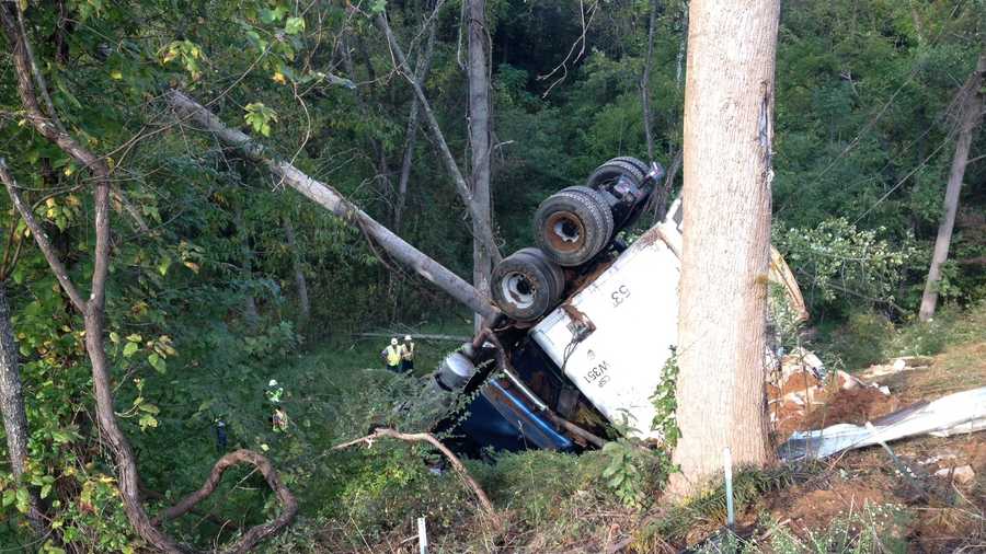 This tractor-trailer went down a steep embankment off US 52 early Friday morning. (Craig Marimpietri/WXII)