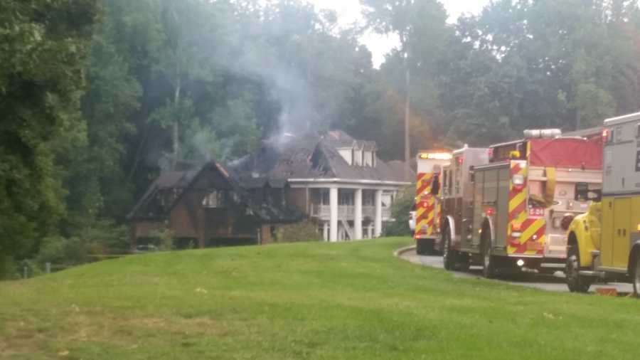Crews battle large house fire in Greensboro