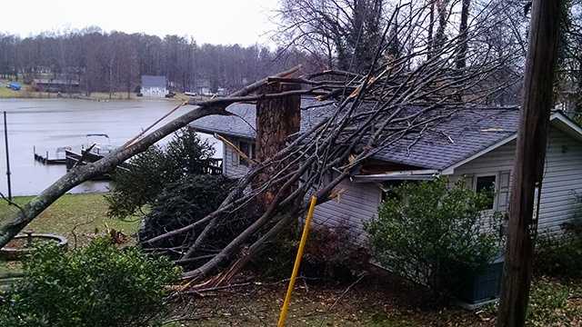 A tree fell on a house on Hickory Point Drive along High Rock Lake.