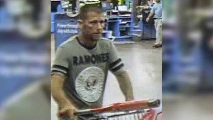 Surveillance image of suspected Walmart robber