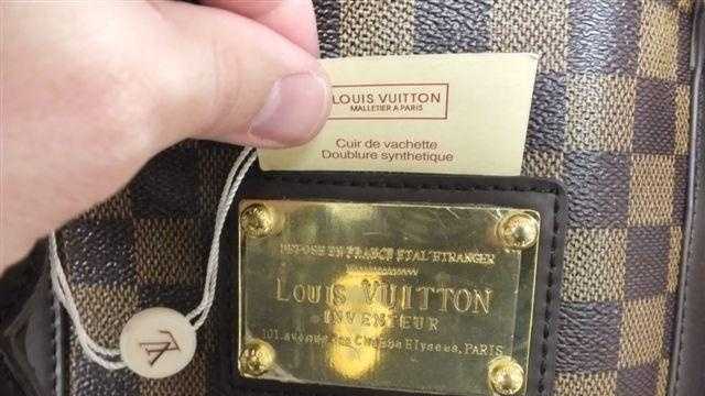 louis vuitton backpack with gold plate