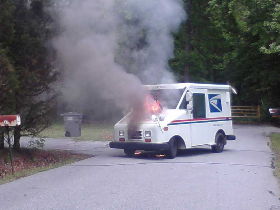 Mail truck catches fire
