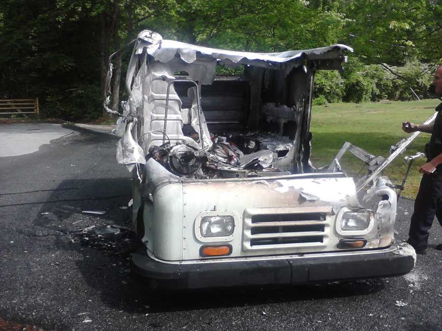Mail truck catches fire
