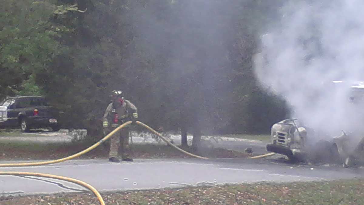 Mail truck catches fire