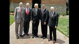 Former U.S. presidents George H. W. Bush, Bill Clinton and Jimmy Carter, with Rev. Billy Graham and Rev. Franklin Graham in front of the Billy Graham Library