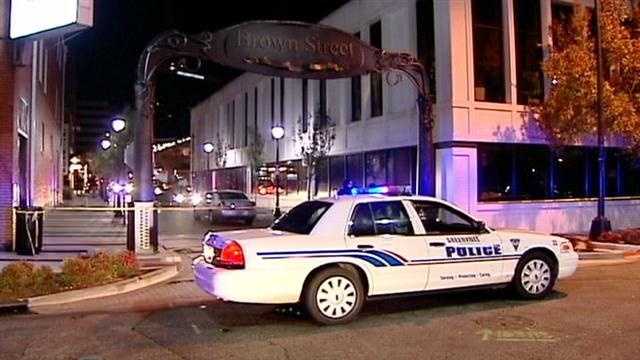 Conflicting reports emerge after an officer involved shooting in Downtown Greenville leaves one person dead.