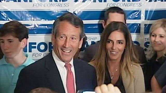 File photo: Former South Carolina Gov. Mark Sanford celebratig his primary runoff victory with his fiancee by his side.