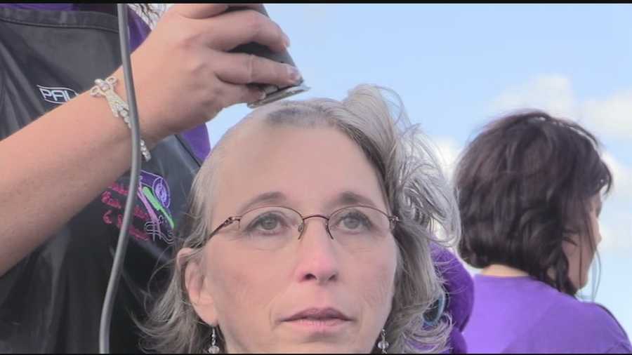 Kandy Kelley, the Pickens County coroner, had her head shaved Saturday as part of the annual Change Cancer with You Change event.