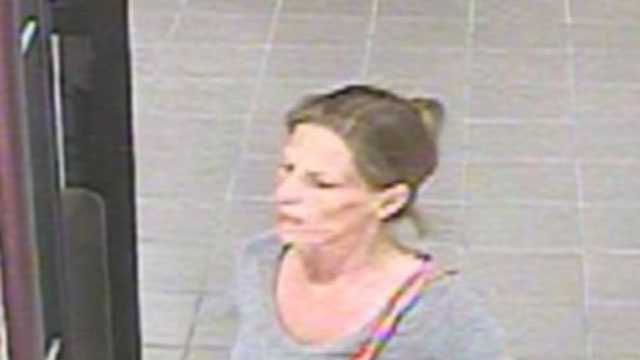 Woman caught on camera using stolen checks