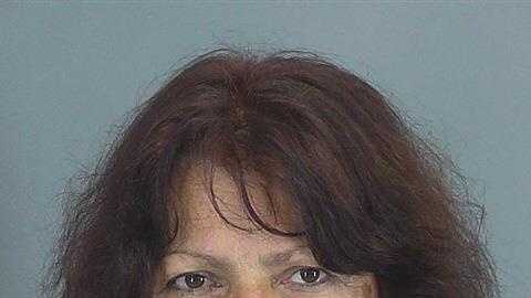 Woman accused of setting home on fire