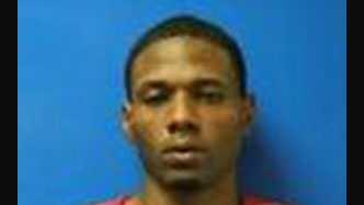 Man accused of firing shots into front door of home