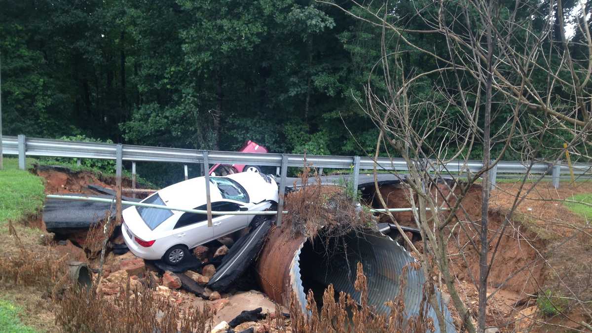 4 injured after part of road washed away in Greer