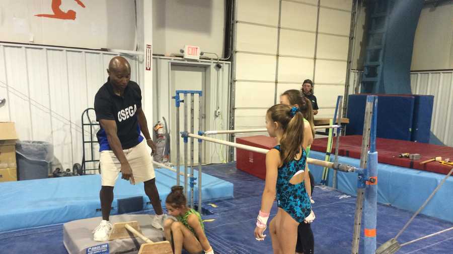 Coach and American Ninja Warrior contestant Miles Avery teaches his students at OSEGA Gymnastics