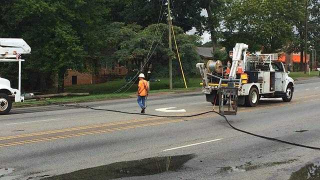 Road reopens after car crashes into utility pole