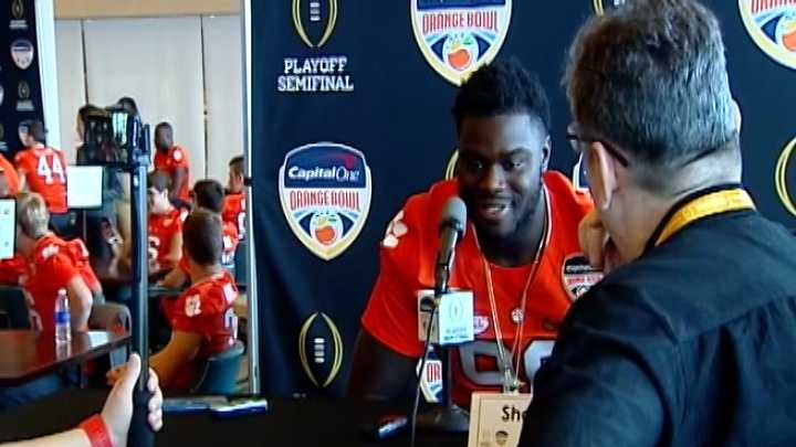 Clemson defensive end and former Daniel High standout Shaq Lawson talks to a reporter during Media Day at the Orange Bowl on Tuesday.
