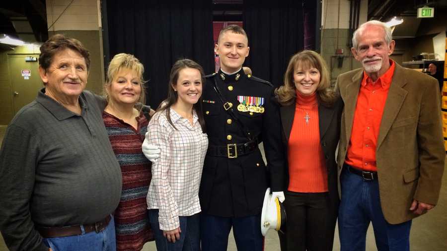 A marine surprised his family and girlfriend at a Clemson Basketball game.