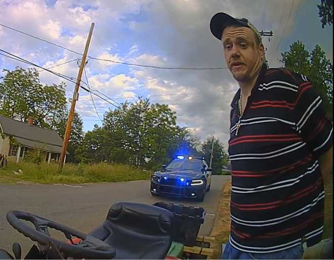 Photo Of Lawn Mower Pulled Over Before Arrest Is An Internet Hit