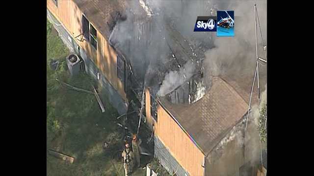 A single-family home was engulfed in flames Friday as WYFF's Sky 4 flew over the scene.