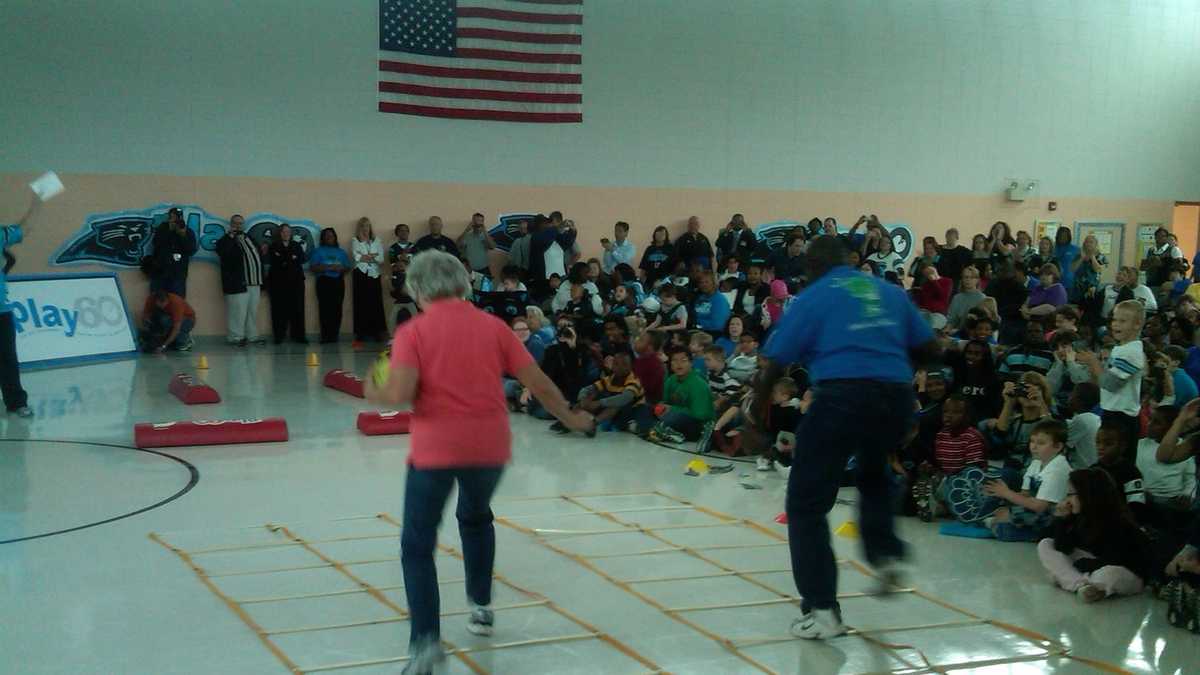 Carolina Panthers' Sir Purr surprises Walkertown Elementary students