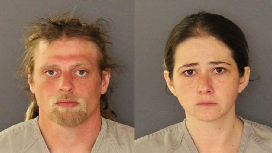 Brandon Kenney and his wife, Christina Kenney, are seen in mug shots after they were arrested.