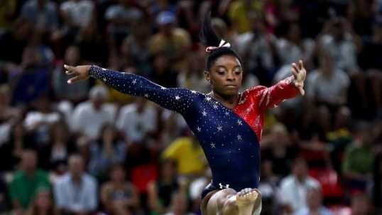 Simone Biles of the United States competes on the balance beam.