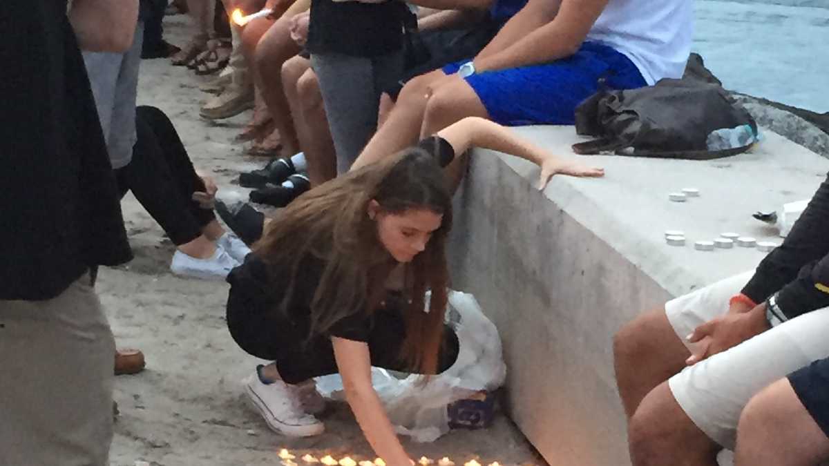Mourners gather to remember teen who was shot and killed