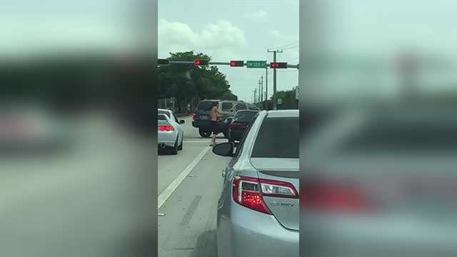 Shirtless man uses baseball bat to smash window in road rage incident