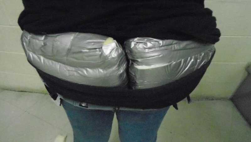 Arizona woman tried to bring heroin into the U.S. by hiding packages in her pants, officials said.