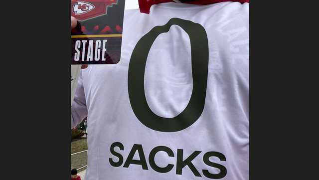 Kansas City Chiefs O-Line wearing '0 Sacks' shirt at Super Bowl parade