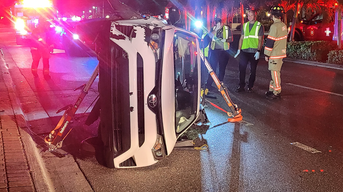 Driver flips SUV after crashing into light pole in Cape Coral