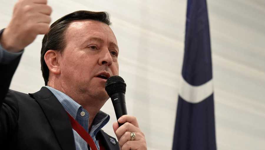 South Carolina Republican Party Chairman Drew McKissick gestures as he speaks to the Richland County GOP convention on Friday, April 30, 2021, in , S.C.