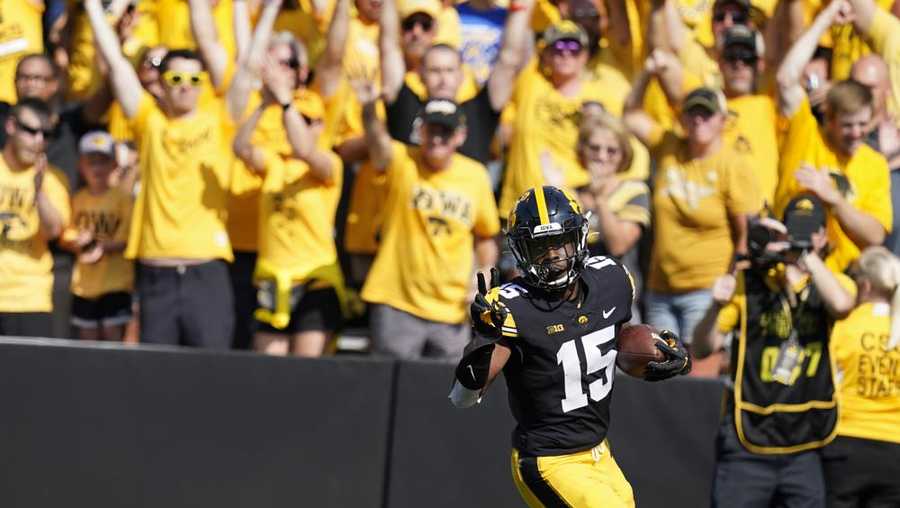 iowa running back tyler goodson (15) celebrates as he scores on a 46-yard touchdown run during the first half of an ncaa college football game against kent state, saturday, sept. 18, 2021, in iowa city, iowa. (ap photo/charlie neibergall)