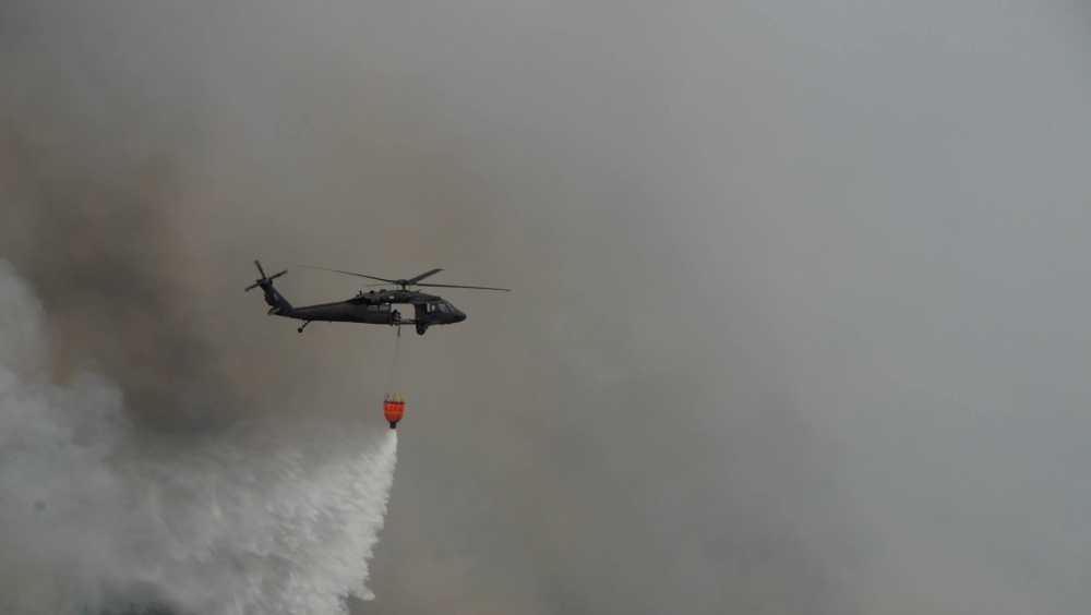 Altona forest fire now 100 percent contained