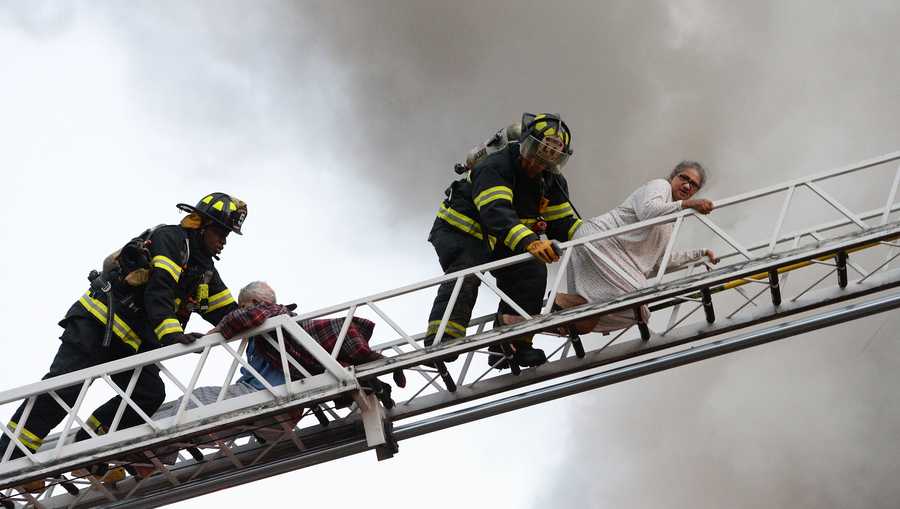 98 Year Old And 95 Year Old Rescued From 3rd Floor During Raging Fire